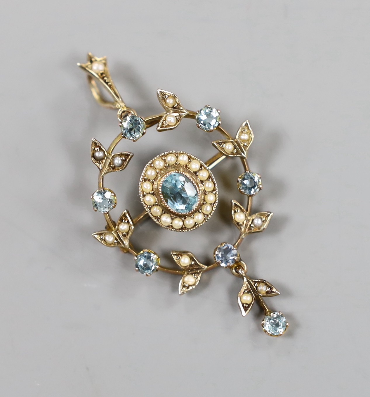 An Edwardian 9ct, blue paste and seed pear set drop pendant, 42mm, gross weight 4.6 grams.